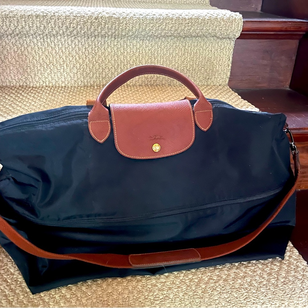 Longchamp zippered expandable carry on tote with strap